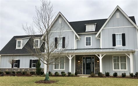 light gray house with metal roof|gray homes with black roofs.